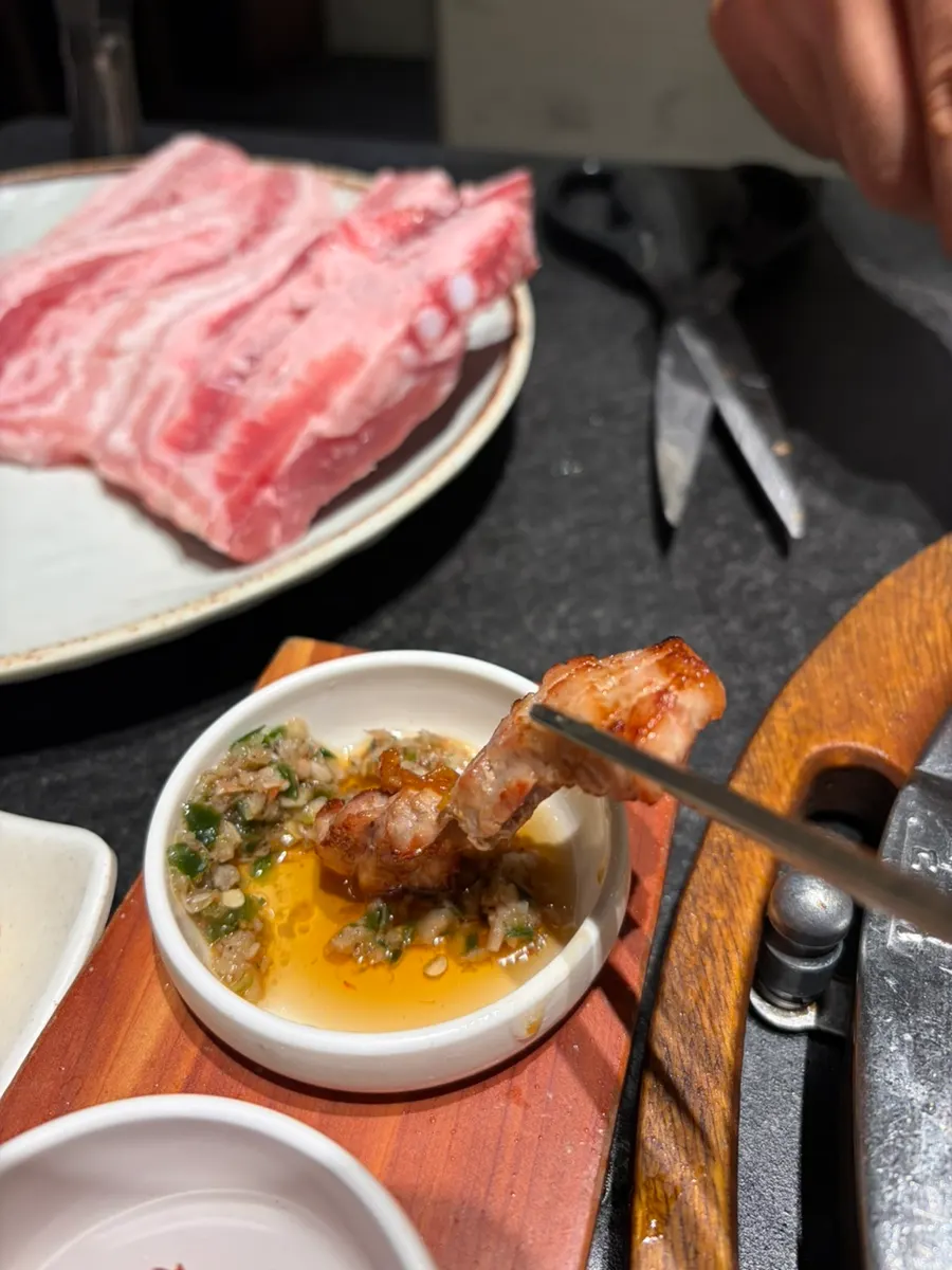 Fully grilled pork ribs infused with charcoal aroma