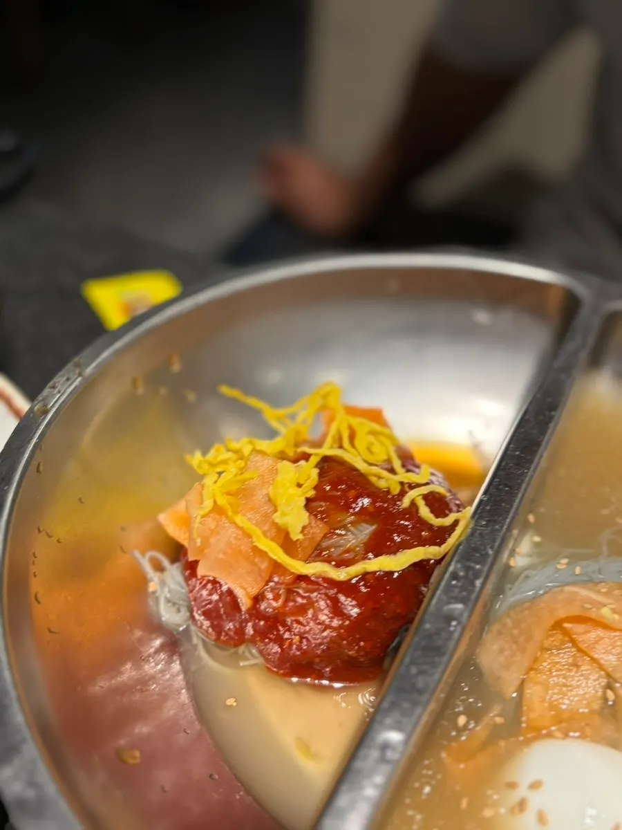 Bibim naengmyeon noodles and water naengmyeon broth