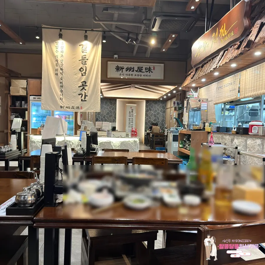 Open kitchen where cooking is visible