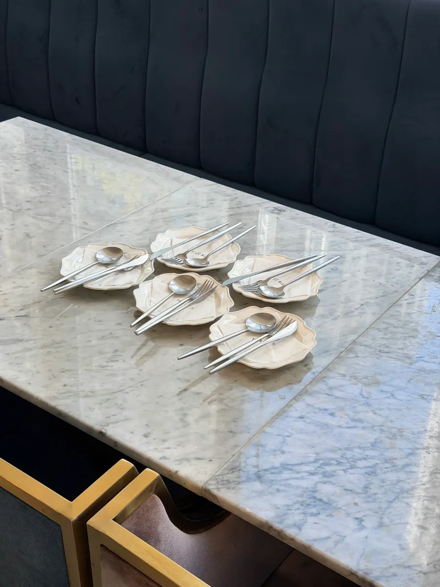 Restaurant tables arranged with wide spacing