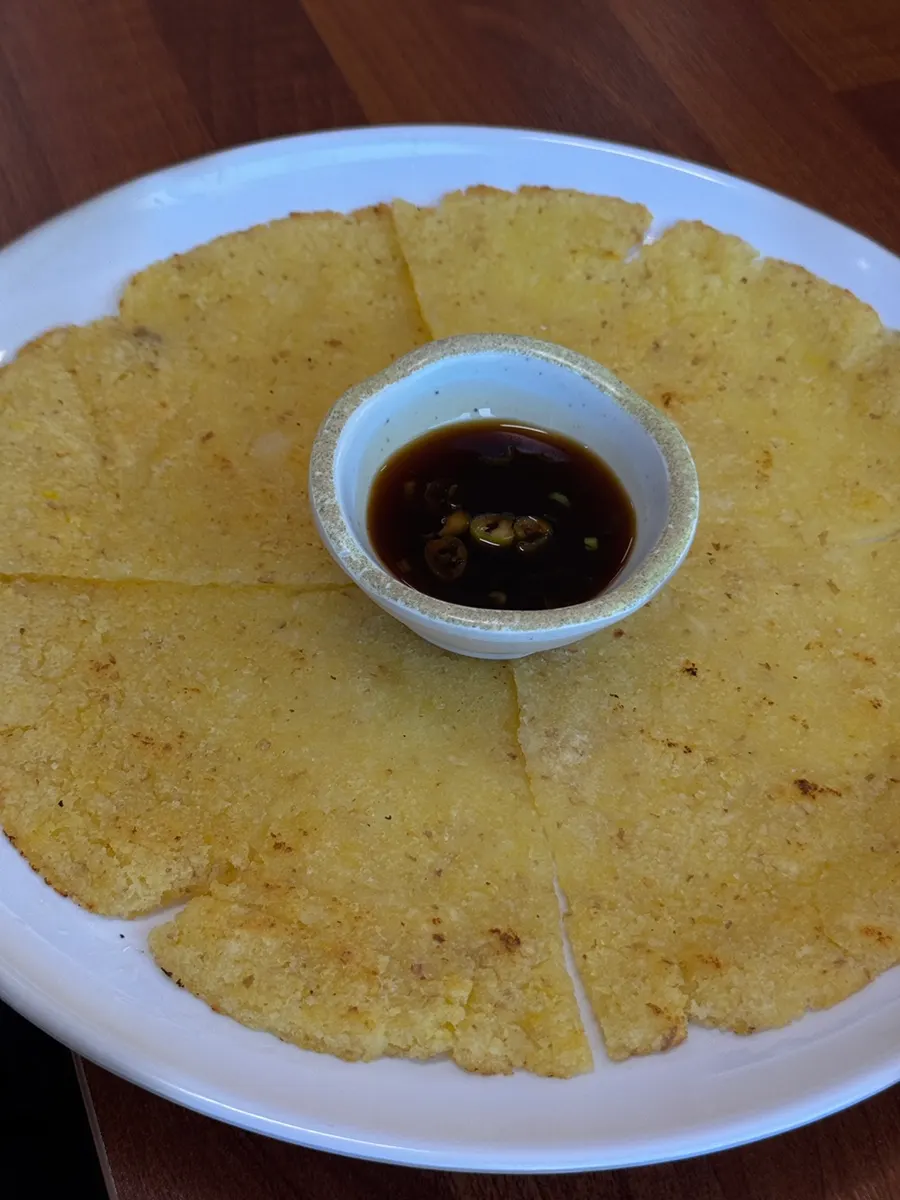 A plate of potato pancake from Deok Ori Jumulleok