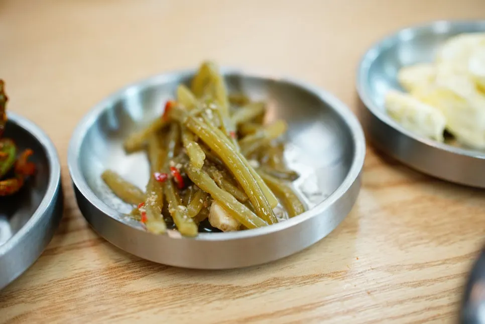 Plate of homestyle side dishes including sweet potato stem