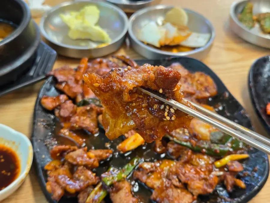Buchujeon topped with spicy radish salad