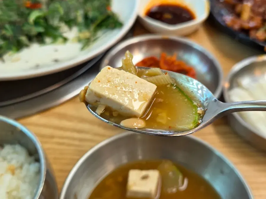 Savory homemade doenjang jjigae served free of charge
