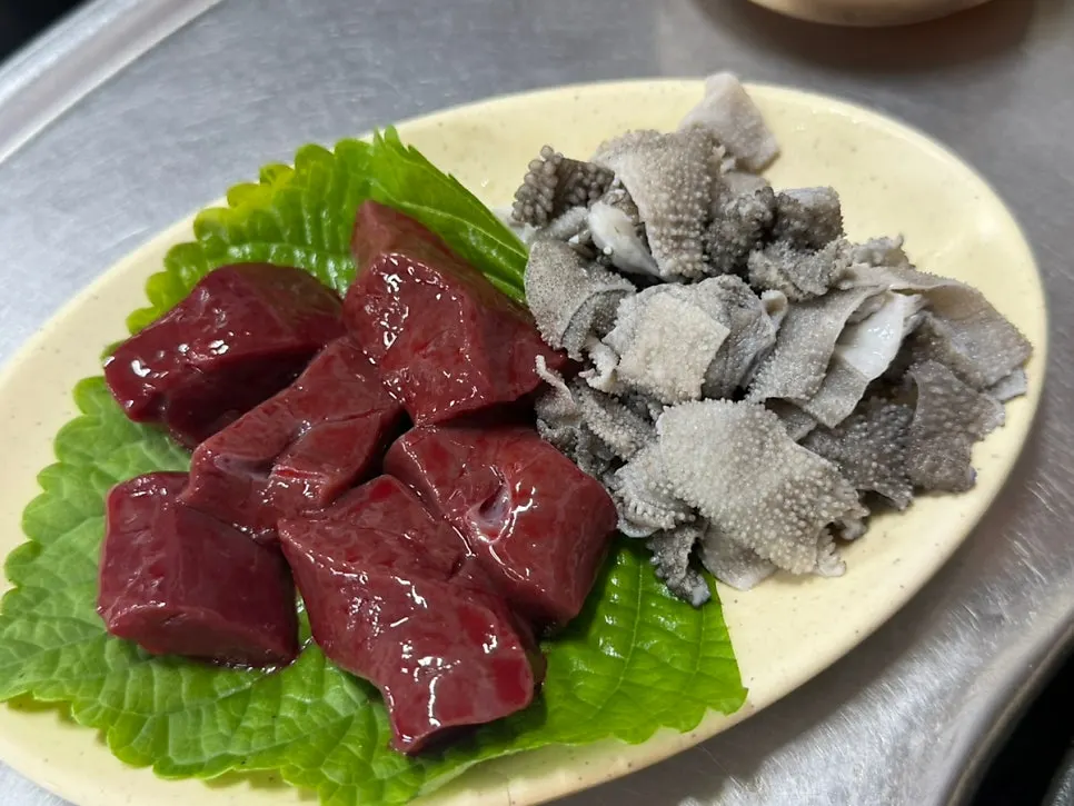 Table spread with gopchang and basic side dishes