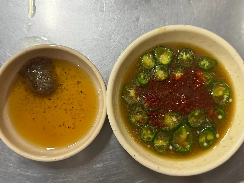 Two dipping sauces served with the gopchang