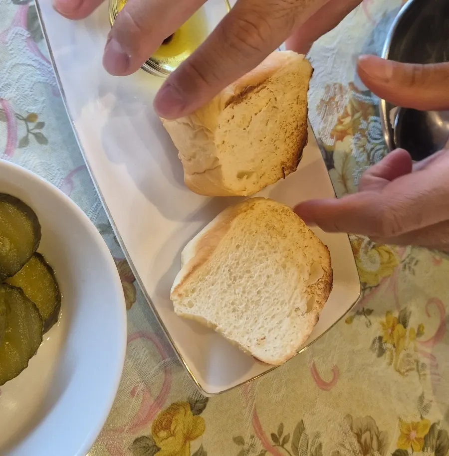 Bread dipped into balsamic sauce