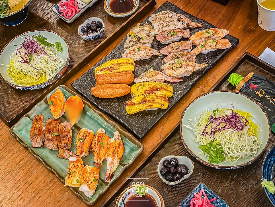 Full spread of the 27-piece flame-seared sushi set