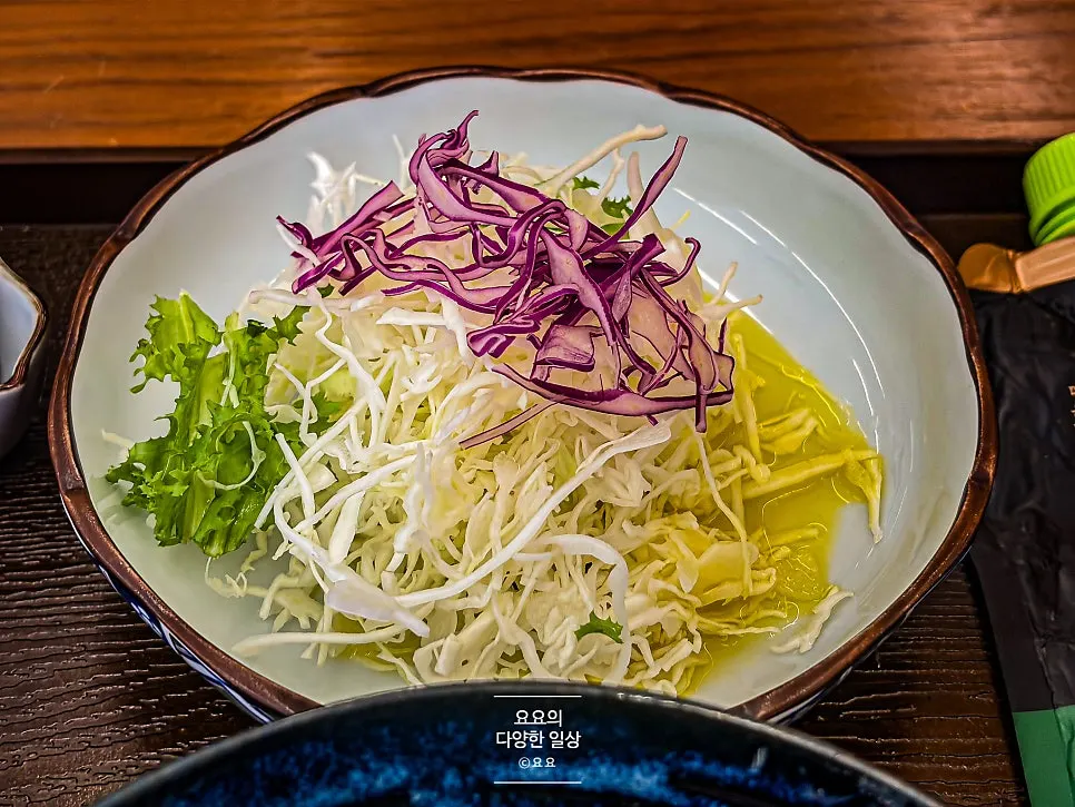 Salad with a yellow-tinted dressing