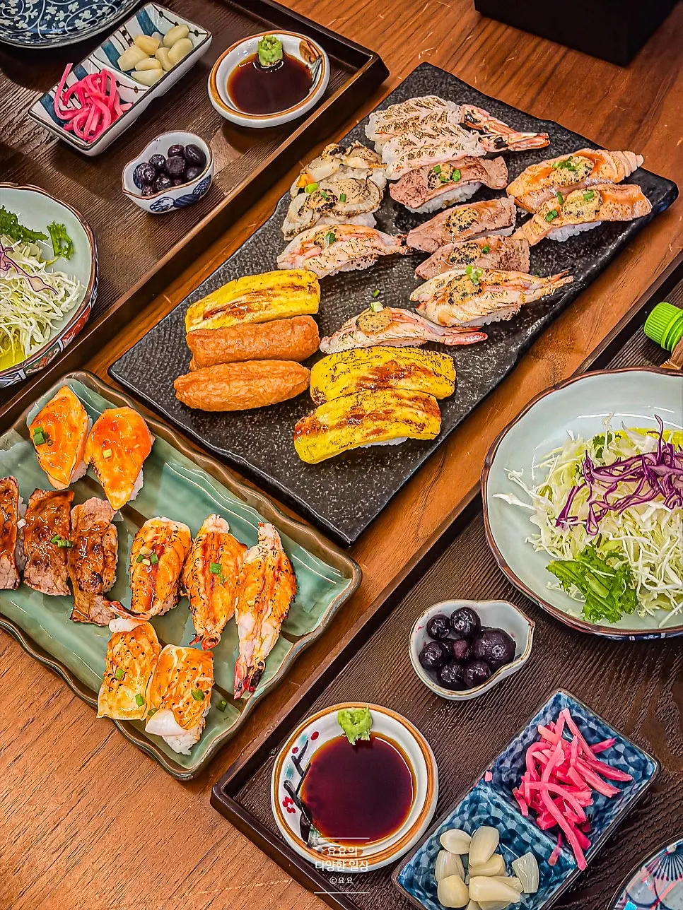 Flame-seared sushi plate with sauce split half-and-half