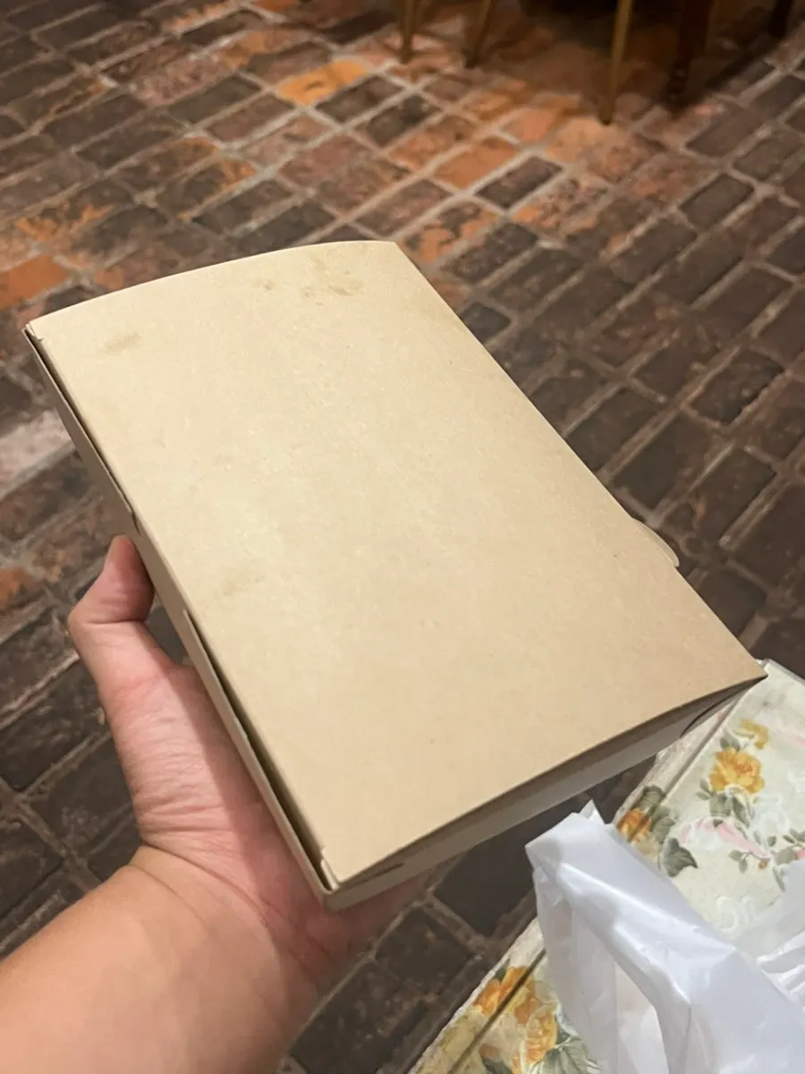 To-go containers packed with leftover food from Anin Jeongmiso