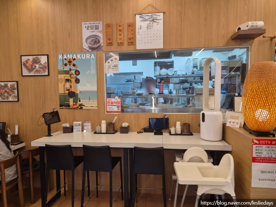 Interior seating at Sushi Hwa on a weekday evening