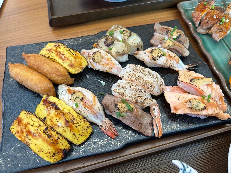 A full plate of the Sushi Hwa 27pcs flame-seared sushi set