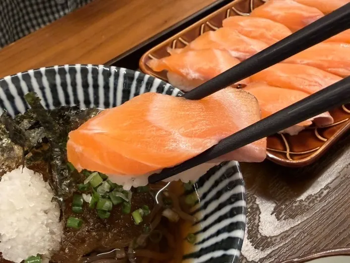 Close-up of vividly colored salmon sushi