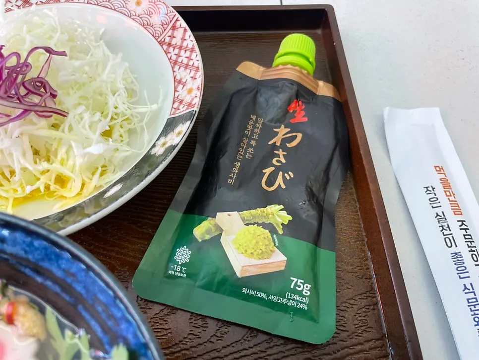 Salad, udon, and blueberries served first
