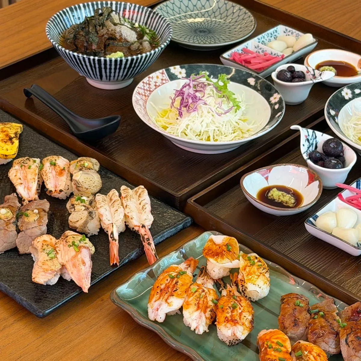 Signature photo of flame sushi at Sushi Hwa in Gimhae's Bongridan-gil