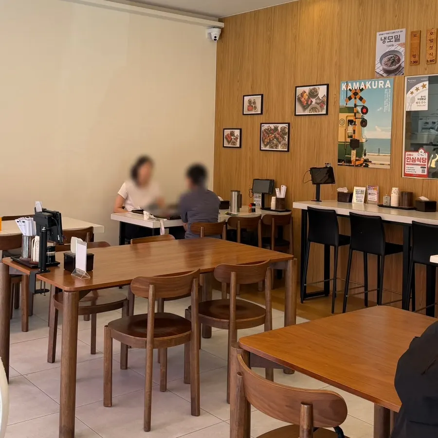 Wood-toned interior of Sushi Hwa