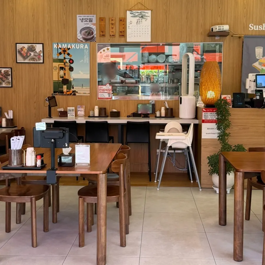 Restaurant tables set up for 2 and 4 diners
