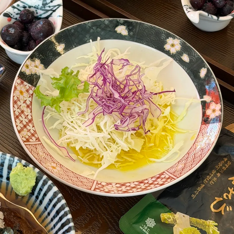 A bowl of cold soba topped with ice
