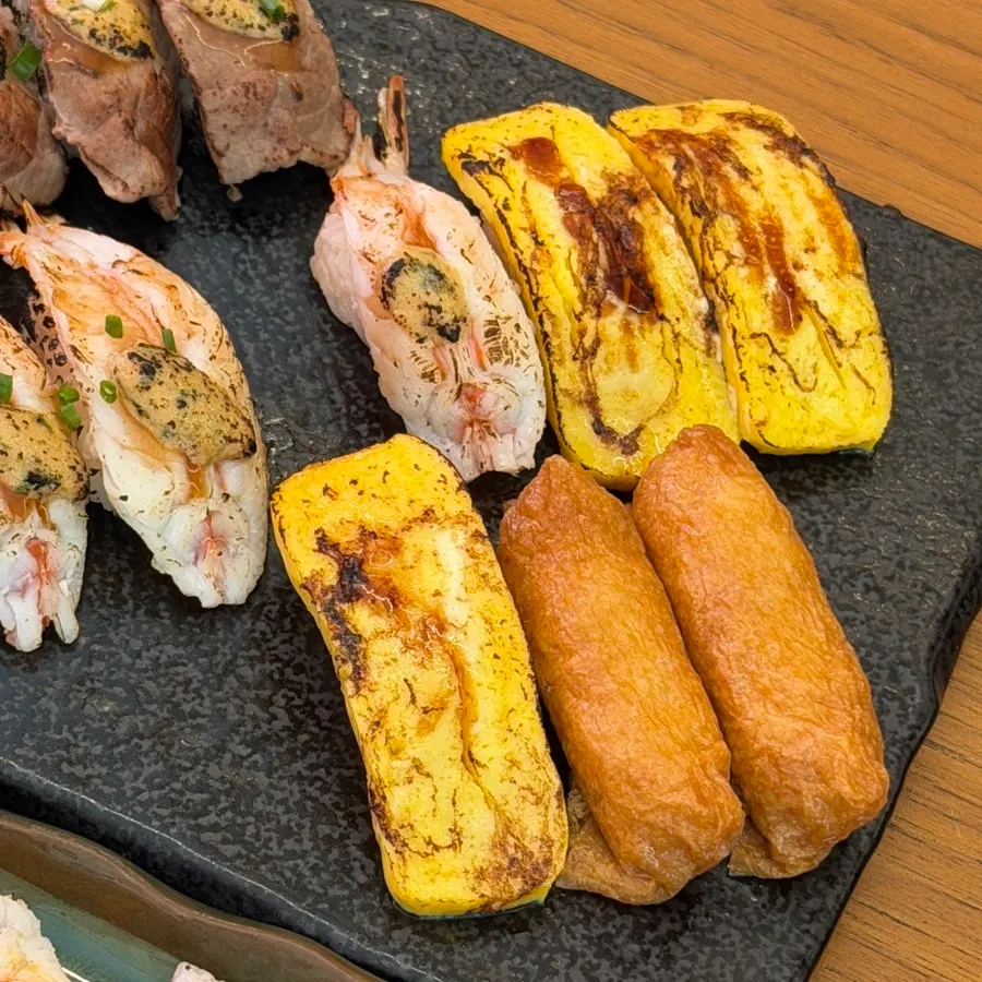 Flame sushi mix including salmon aburi and wagyu