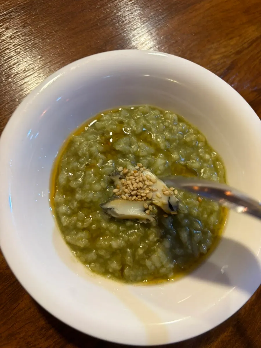 Warm abalone porridge at the start of the course
