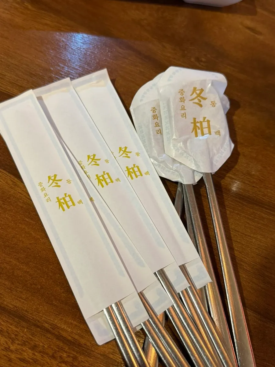 A table neatly set before the meal at Dongbaek