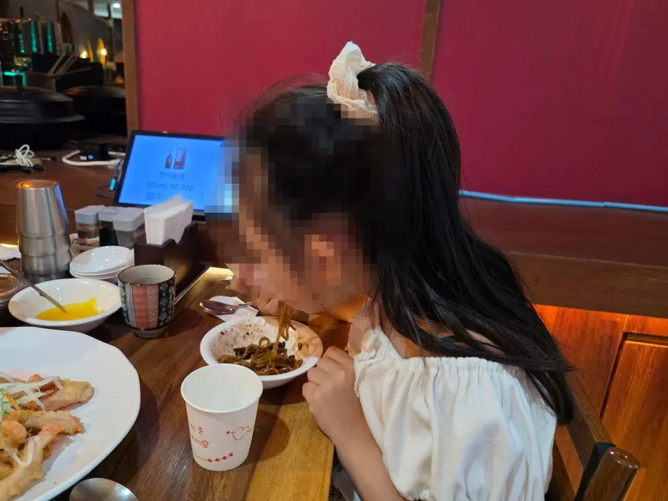 Chinese meal enjoyed with a child