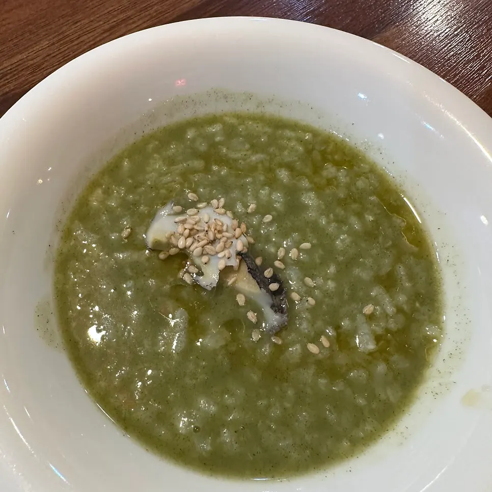 Abalone porridge and Dongbaek cold appetizer served as the first course