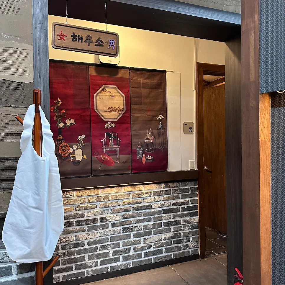 A dining table at Dongbaek, a room-seat restaurant in Gimhae