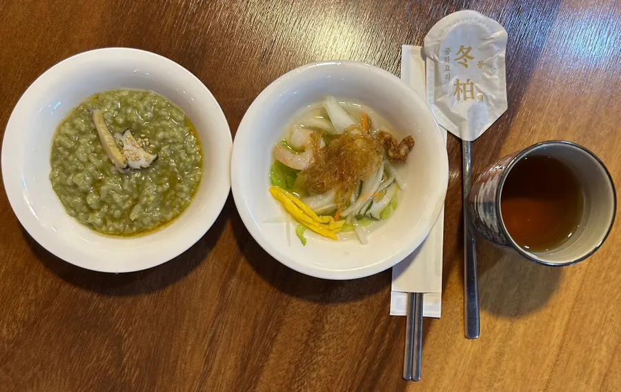 Abalone porridge and Dongbaek cold salad, the course's first dishes
