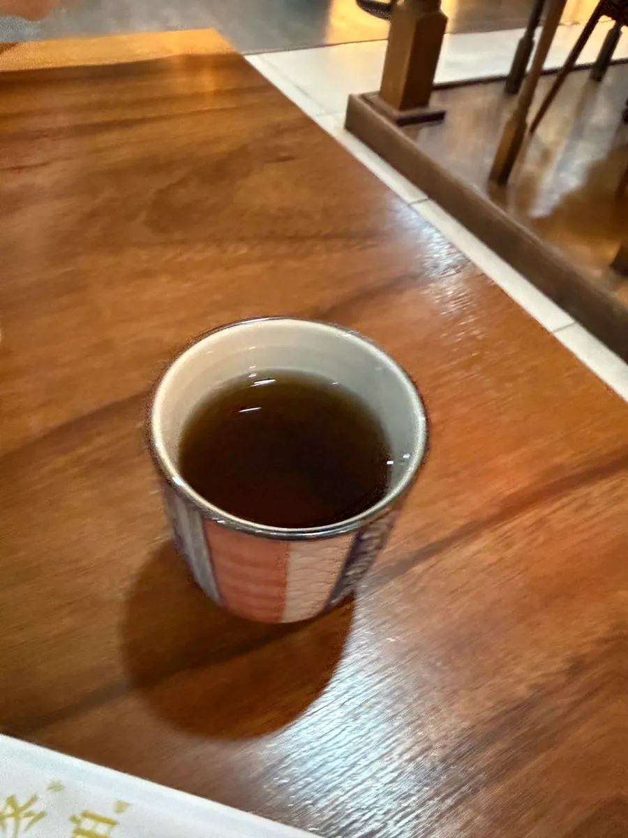 Warm tea served before the meal