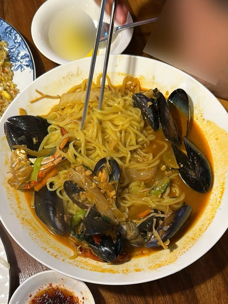 Clams, mussels, and blue crab in the seafood jjamppong