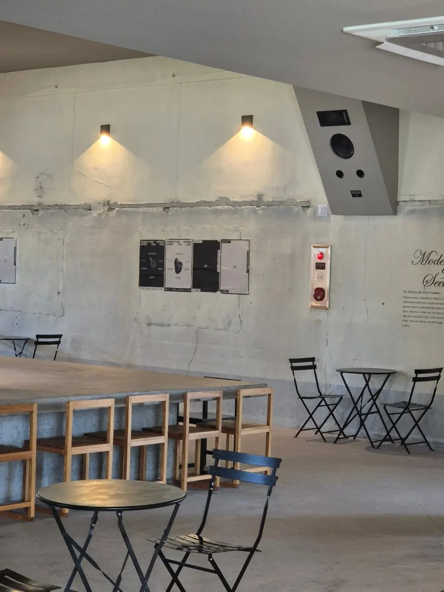 Café with garden landscaping and photo zones