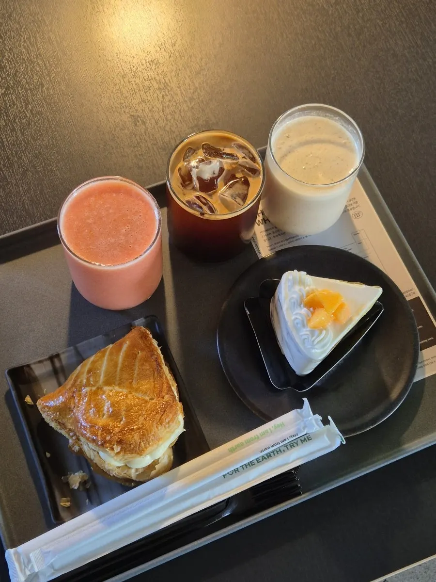Self-picked drinks and desserts laid out
