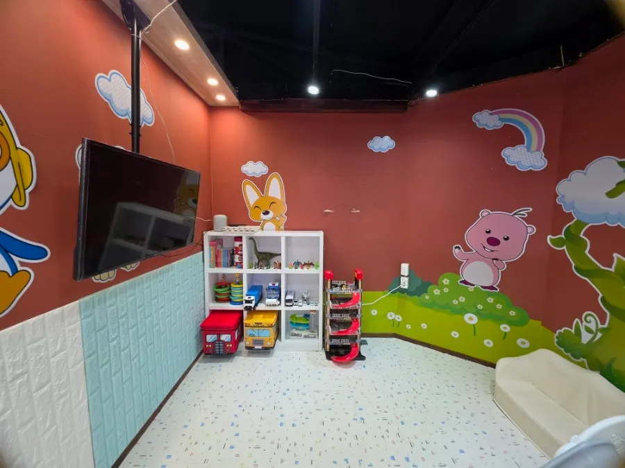 Inside view of the kids' zone playroom