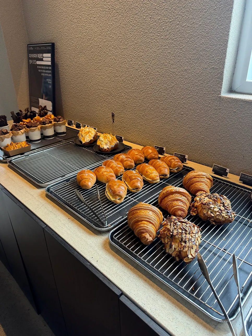 Bread display with salt bread and financiers