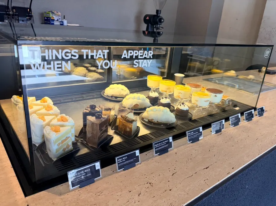 Cakes and wakppu salt bread on display