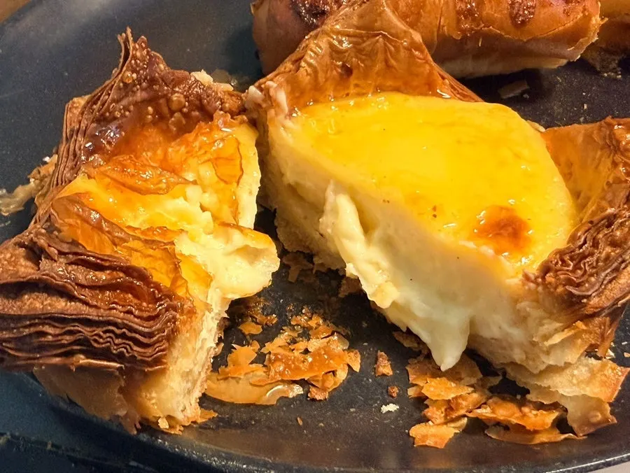 Egg pie with visible flaky layers