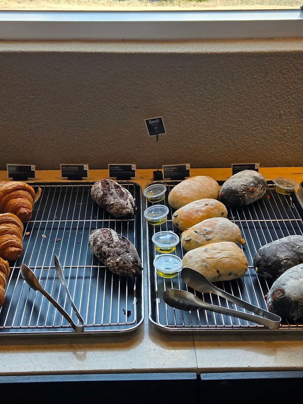 Display case with baguettes and sandwiches