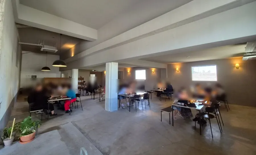 Widely spaced seating in the small library area