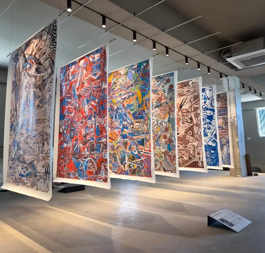Artwork hung above the stone table