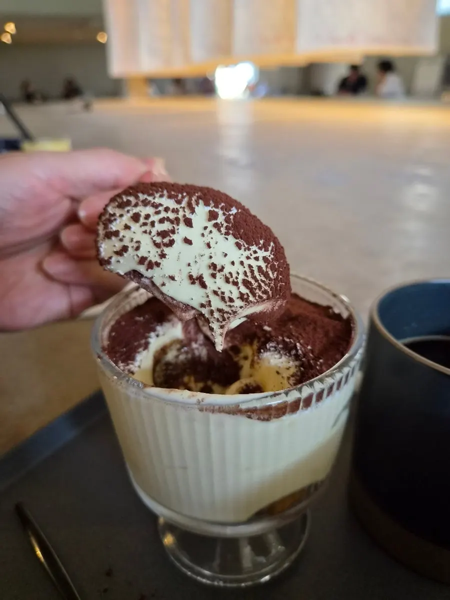 Tiramisu served in a glass cup at Peer a Peer