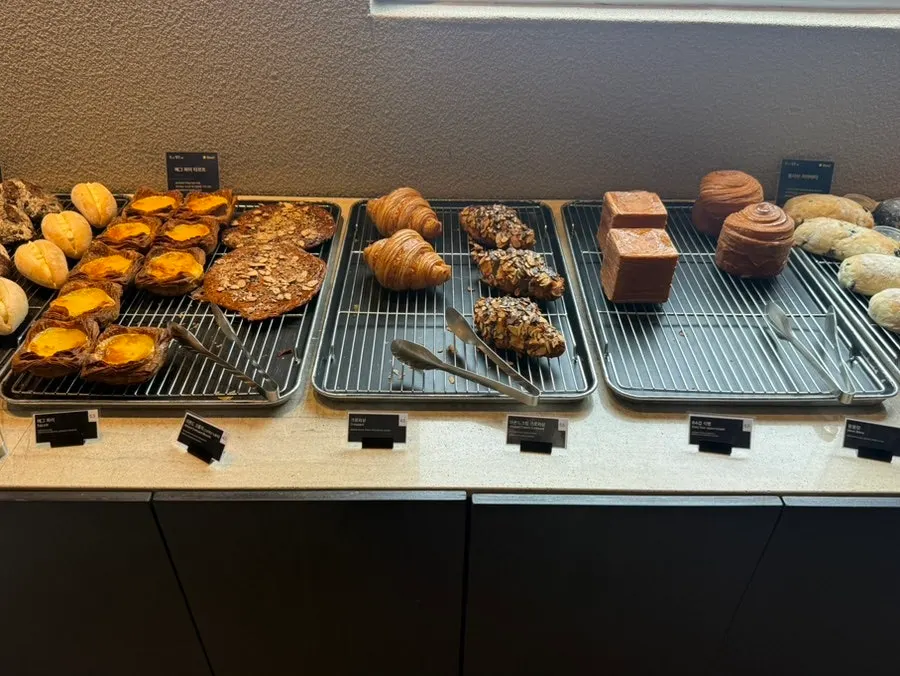 Menu board listing apple cream pie and triple cheese ciabatta