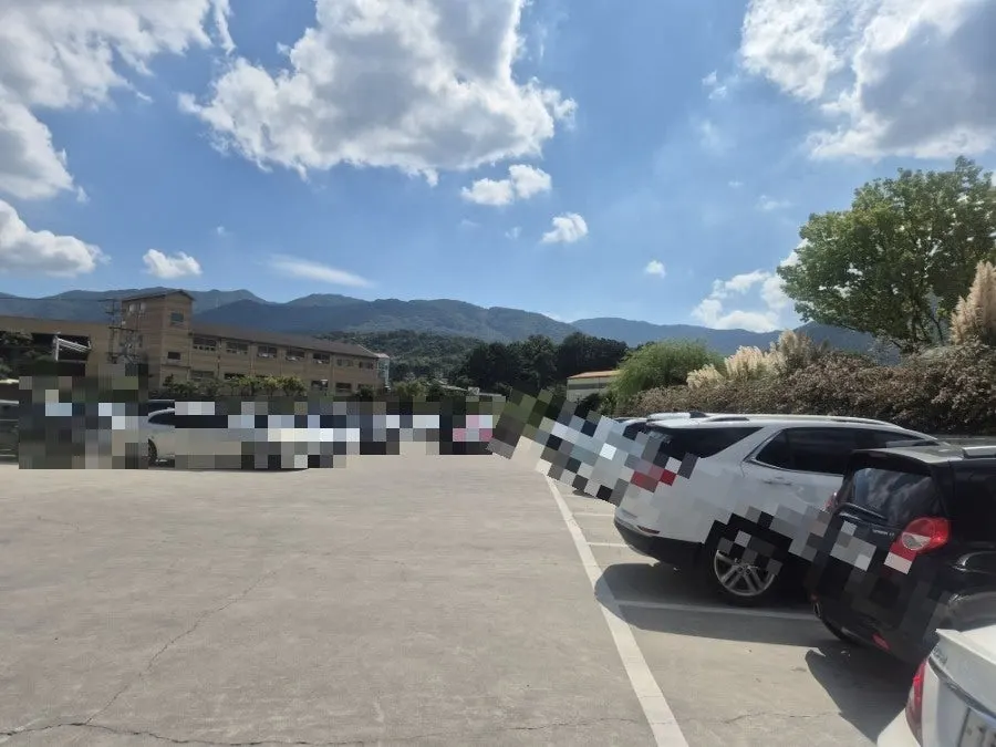 Private outdoor parking lot in front of Peer a Peer