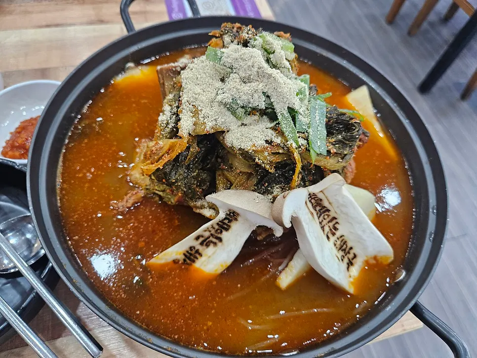 Gamjatang broth bubbling as it simmers