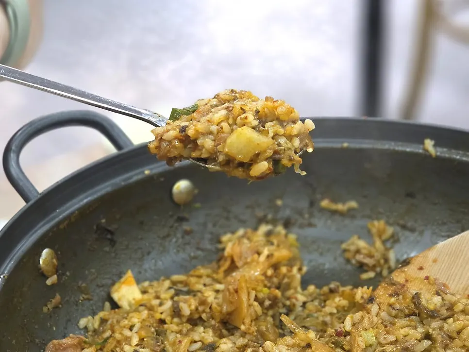 Pot of fried rice almost completely finished