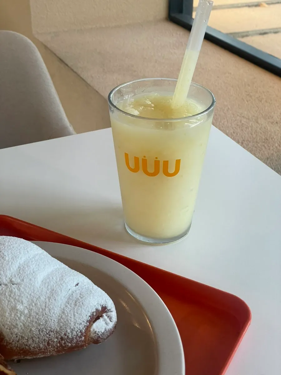 Drinks and bread laid out on the table