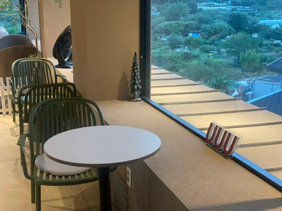 Window seat at Yu Yu Yu with mountain view
