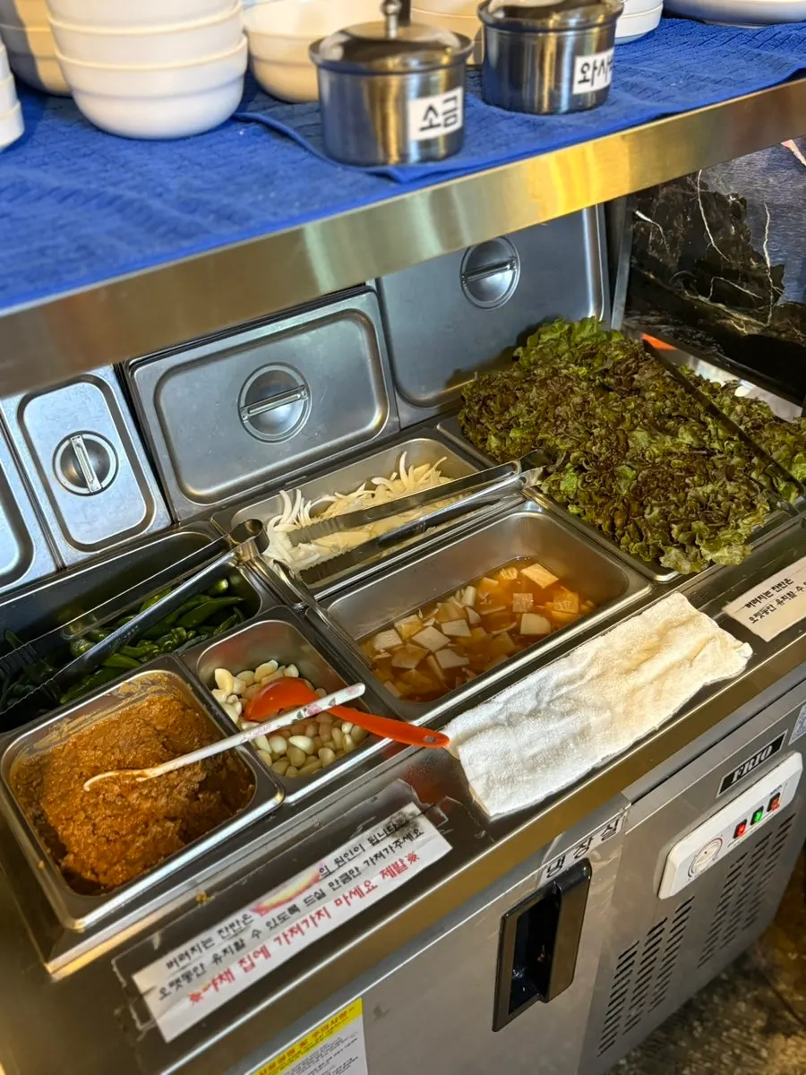 Menu listing beef short rib and meal items