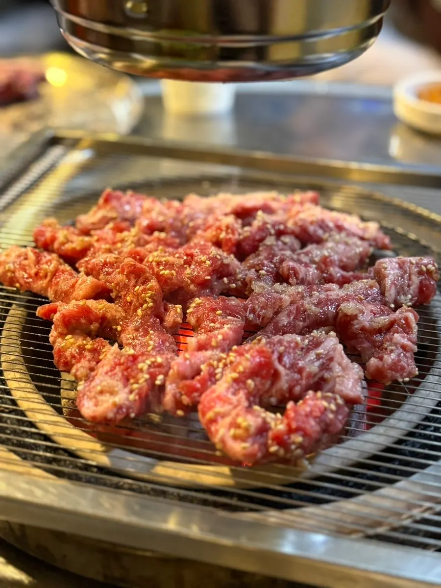Marinated beef short rib placed on the charcoal grill